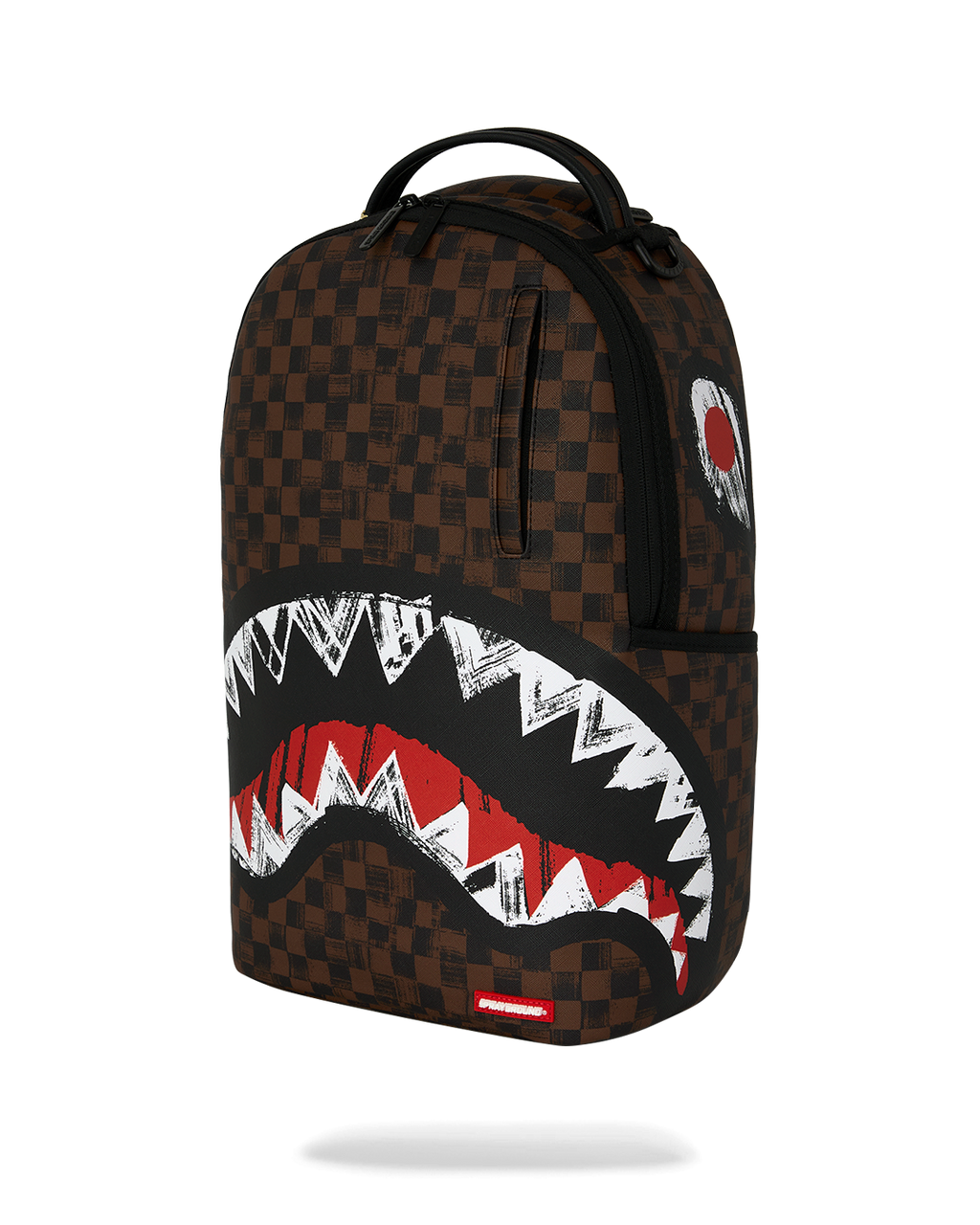 Sprayground backpack front view with brown checkered fabric and red/white shark graphic