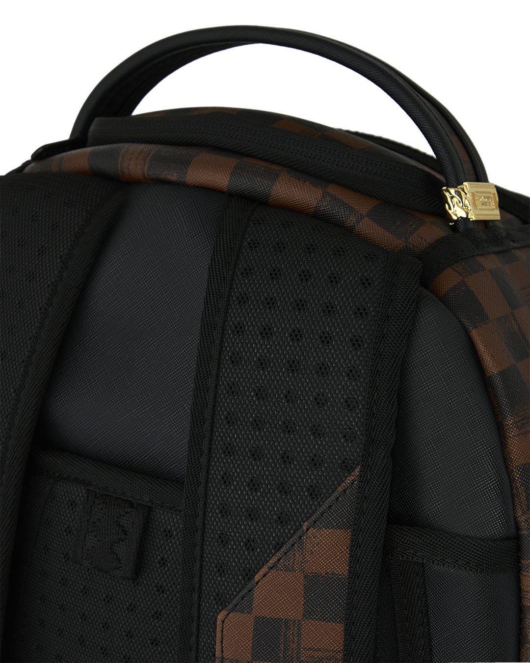 Sprayground backpack interior close-up with black padding and webbed shoulder straps
