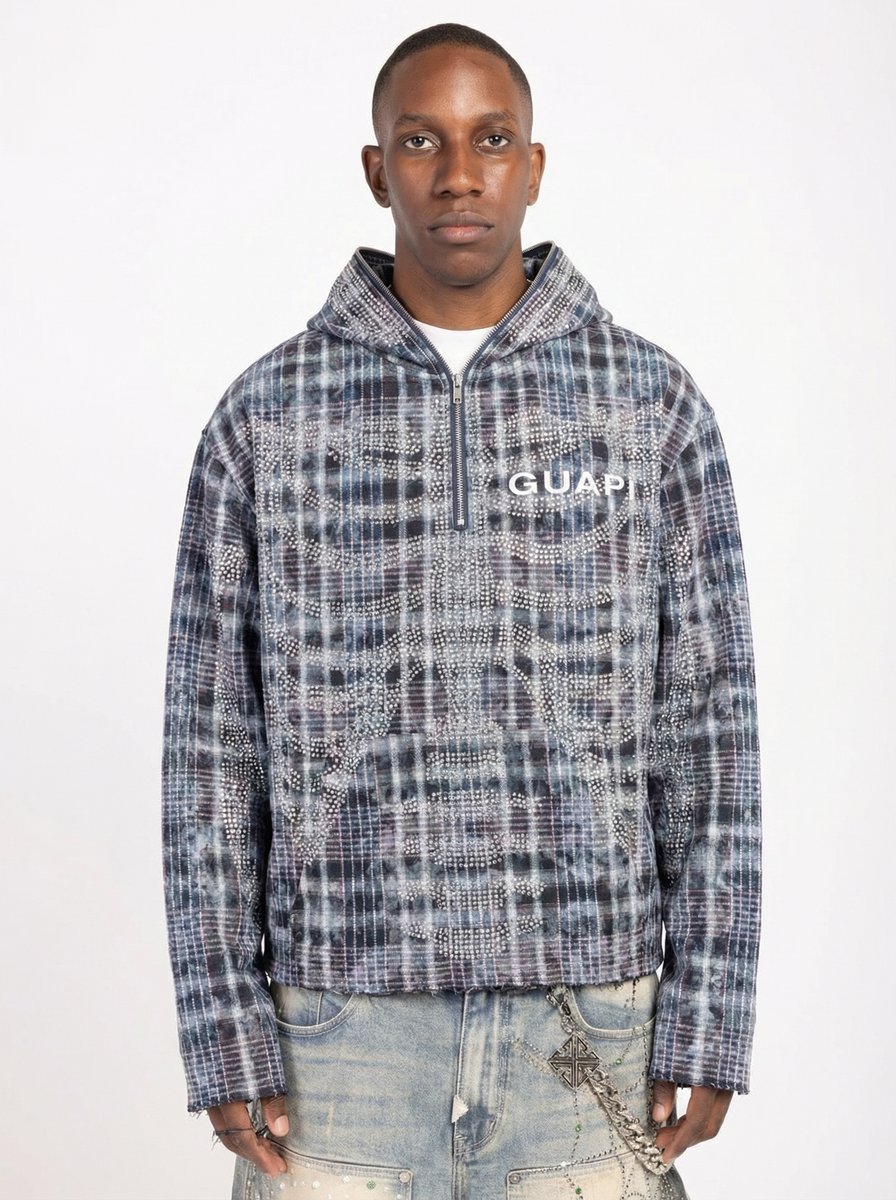 Men's blue skeleton half-zip hoodie with plaid print, hood, and GUAPI logo