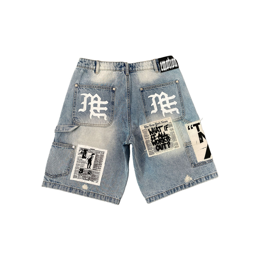 Men's blue denim shorts with side patch graphics and torn hem