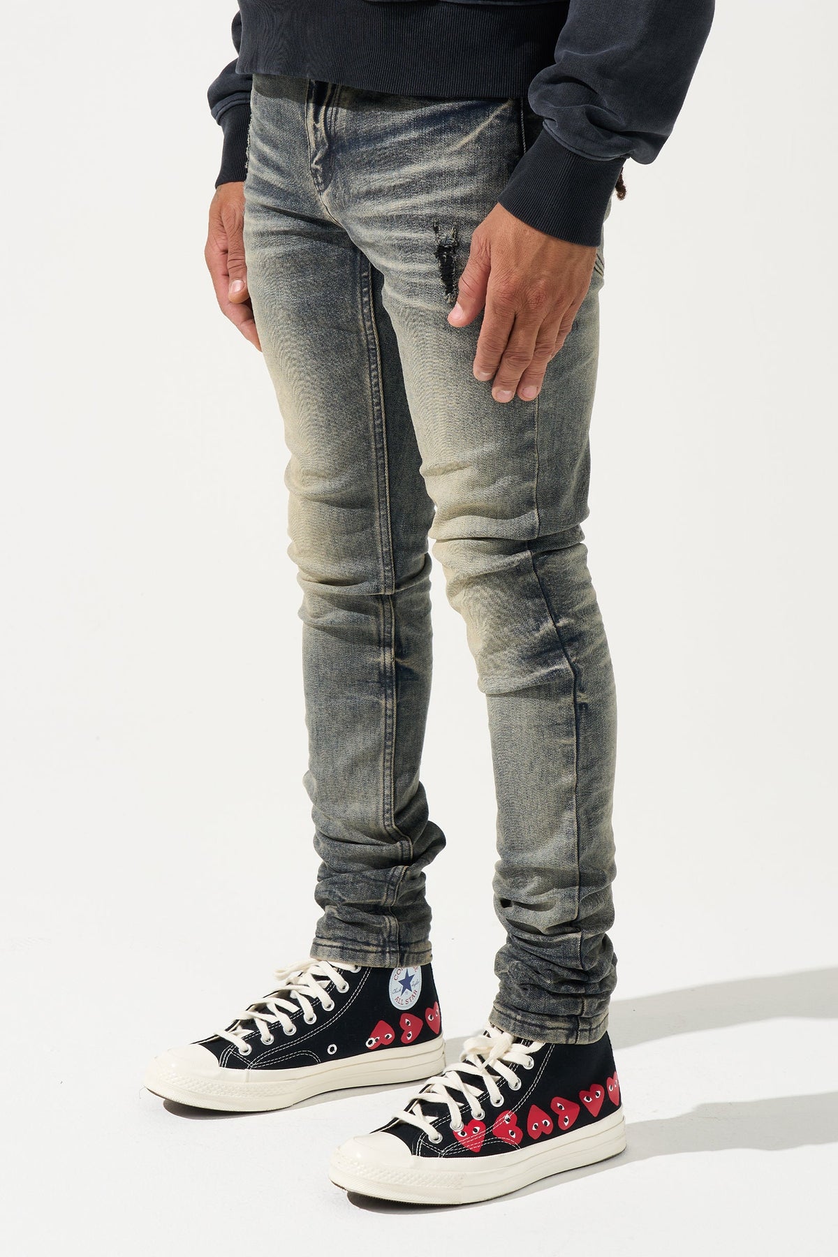 Men's gunmetal-wash slim jeans with ruched ankle cuffs and distressed fading
