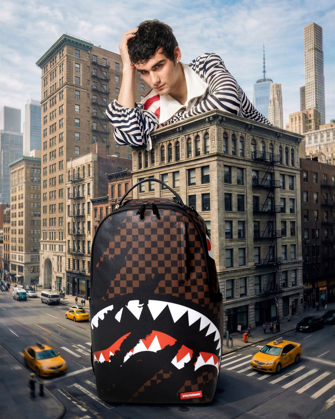 Checkered black backpack with red and white shark mouth artwork