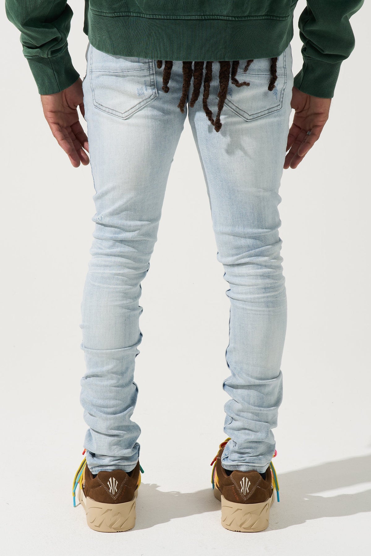 Men's ICE jeans, back view in light blue wash with two rear pockets