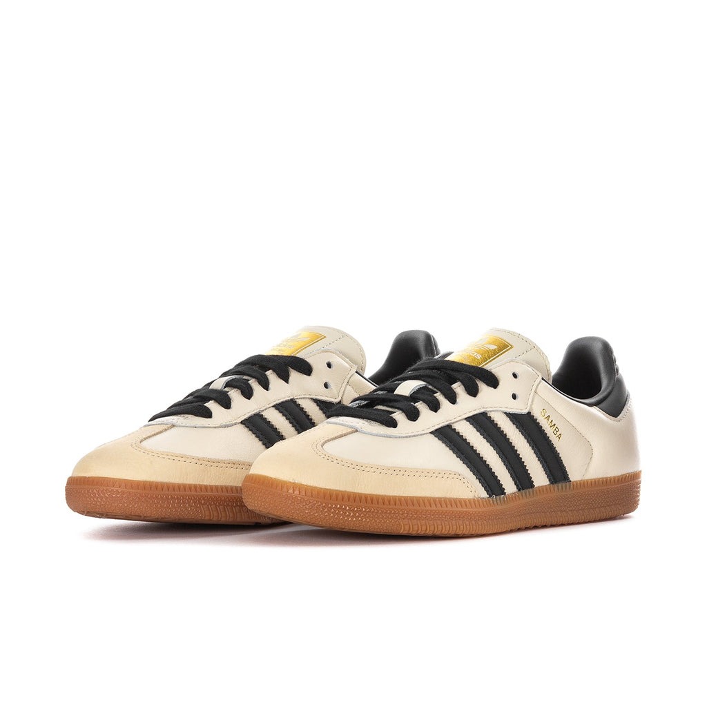 Adidas Samba OG women's sneakers, cream uppers with black stripes and tan gum sole, lace-up.
