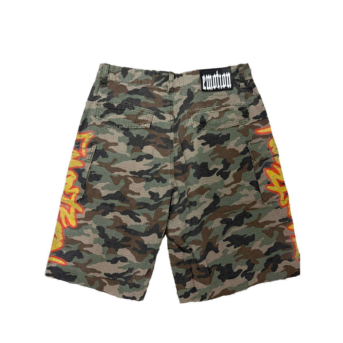 Men's camo shorts with orange graphic side stripes and dark logo patch