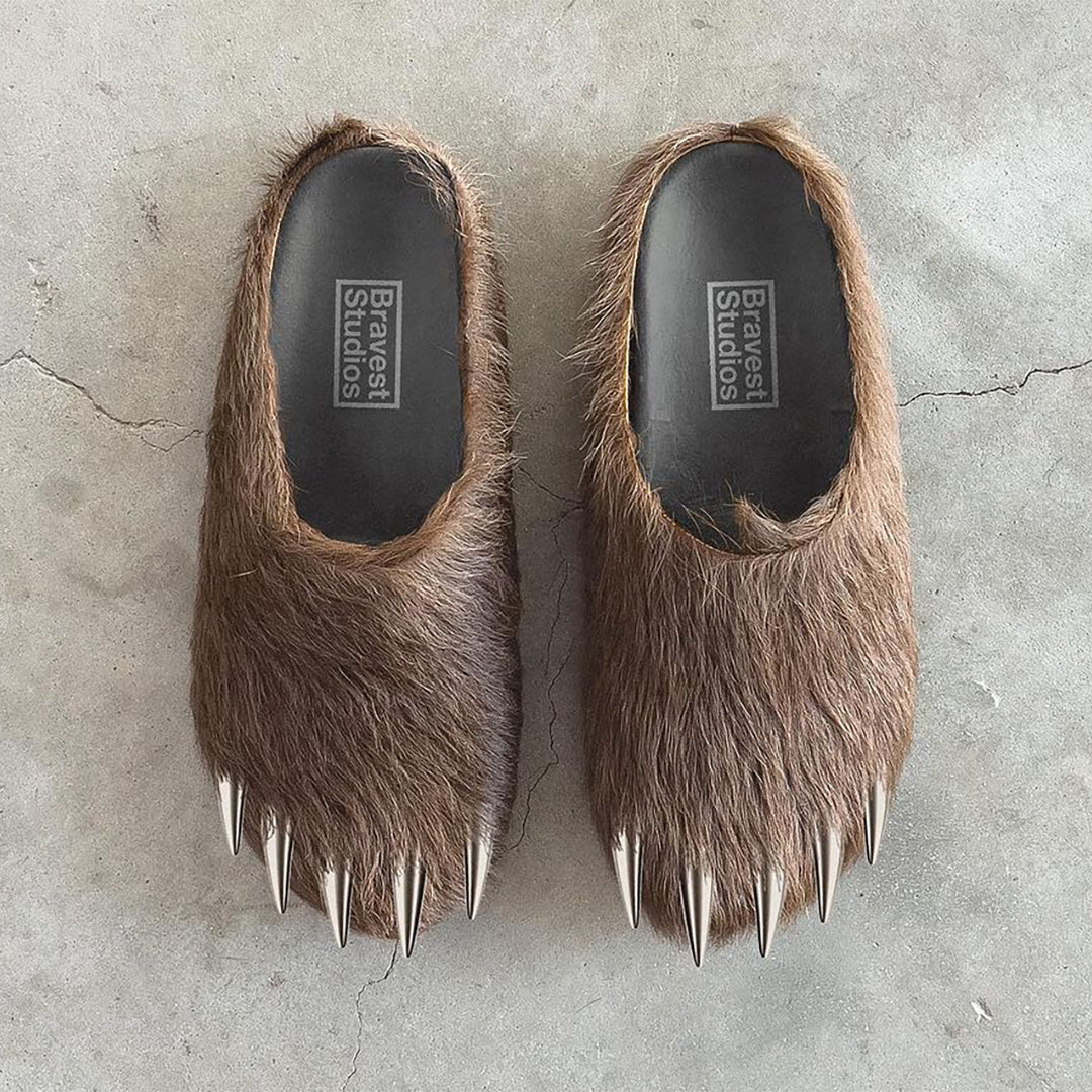 Brown bear claw mules with metal spikes and black insoles, top view