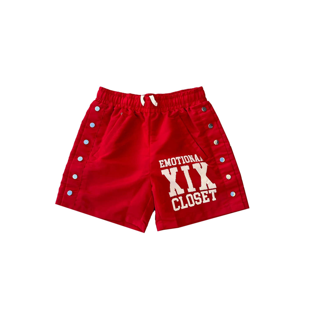 Red men's nylon backyard shorts with elastic waistband and drawstring; front graphic print