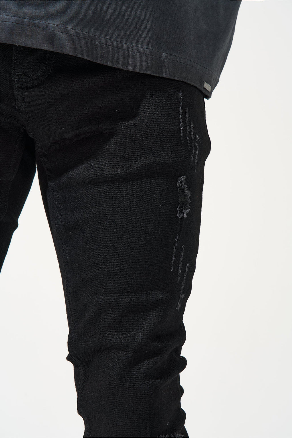 Men's jet black jeans with knee distress and straight leg