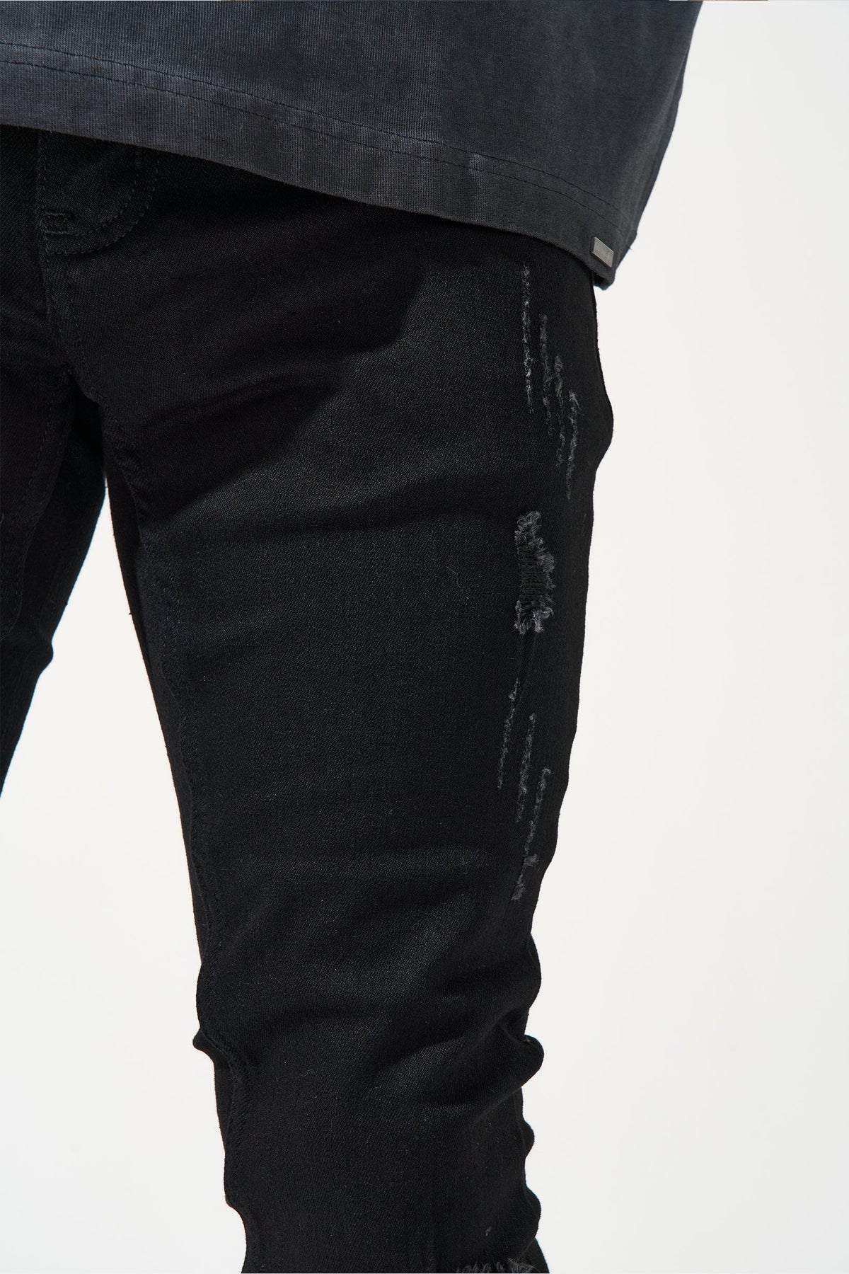 Men's jet black jeans with knee distress and straight leg