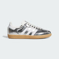 Kids' Samba OG J sneakers in silver metallic with white laces and gum sole.