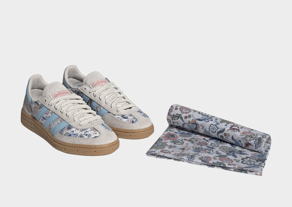 Kids' adidas Spezial sneakers pair in off-white suede with blue floral side panels