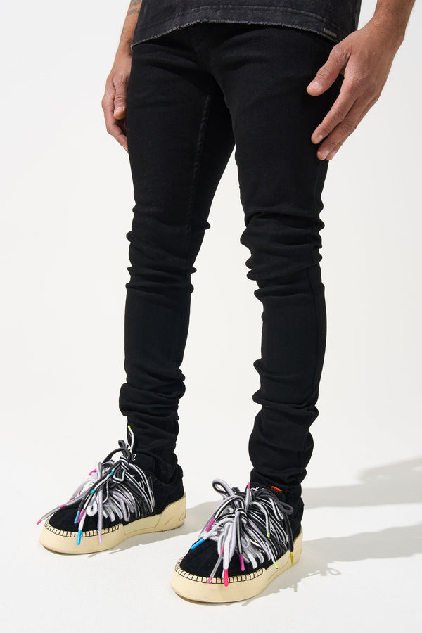 Men's black slim-fit jeans with ruched knee detail