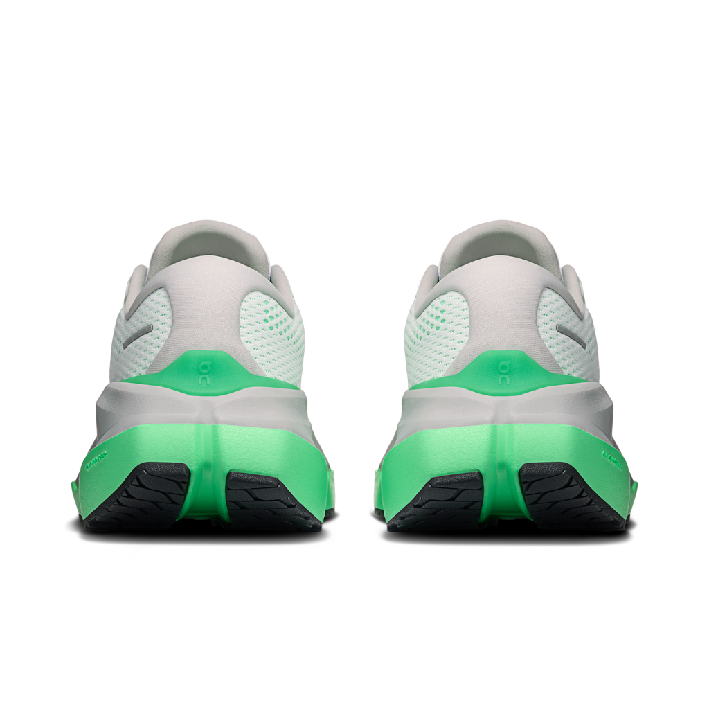 Women's running shoes, rear view with mint-green heel and black tread inserts