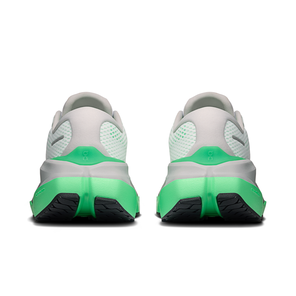 Women's running shoes, rear view with mint-green heel and black tread inserts