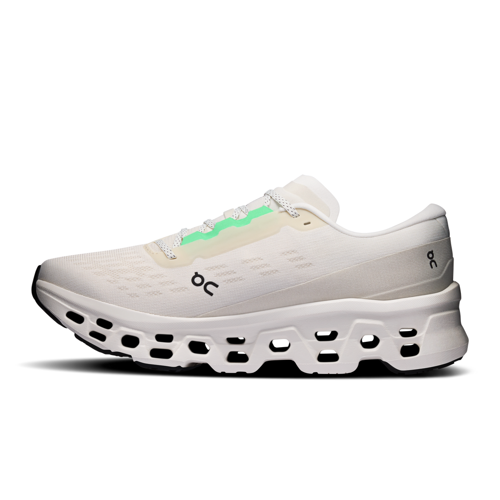 Men's ivory running shoes with On logo, green lace accents, CloudTec midsole