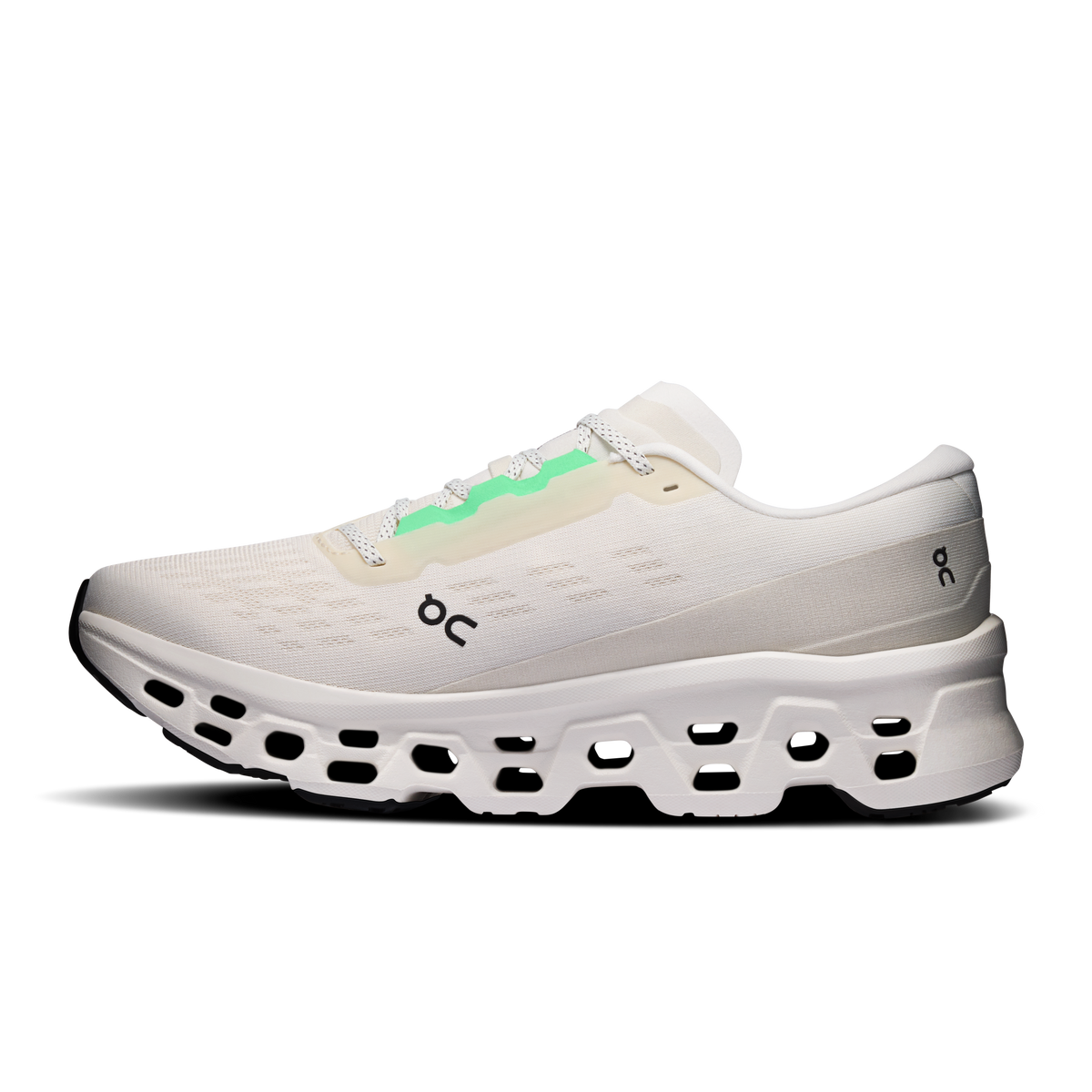 Men's ivory running shoes with On logo, green lace accents, CloudTec midsole