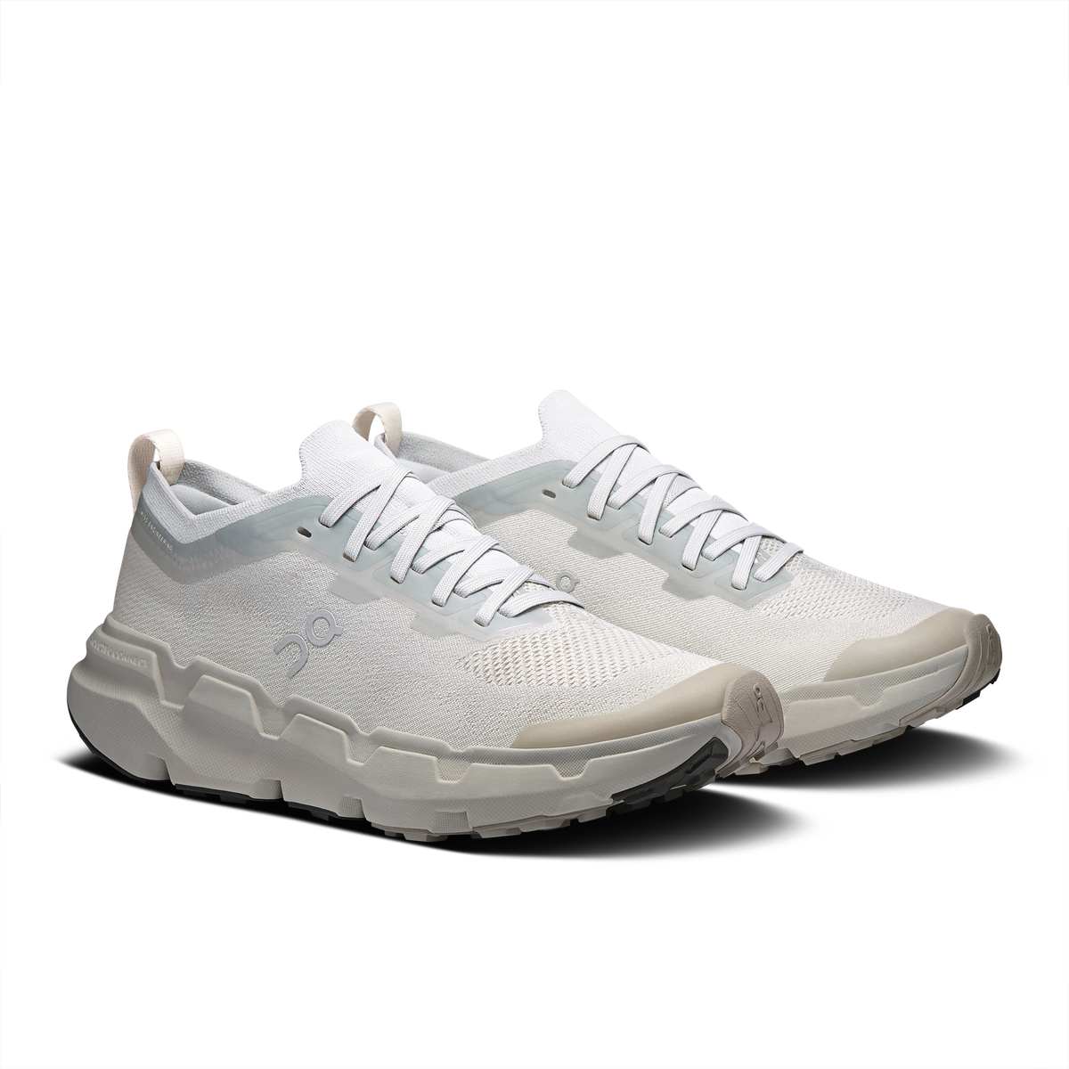 Women’s running shoes, two-tone pearl knit with light-blue accents, front view, molded sole