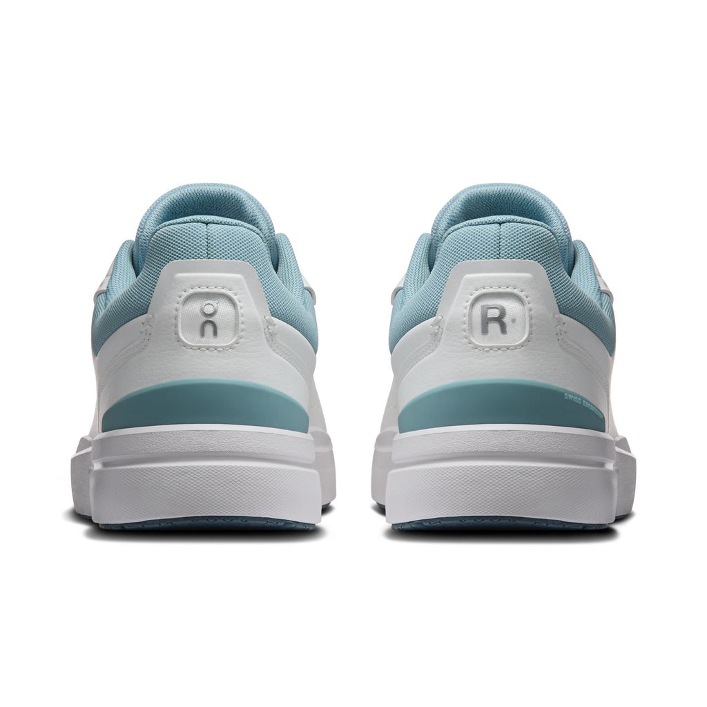Men's heel view sneakers with white upper, light blue lining, and R logo