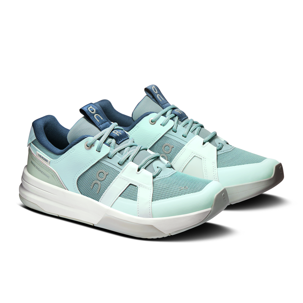 Women's mint and blue lace-up running shoes, side view with padded collar