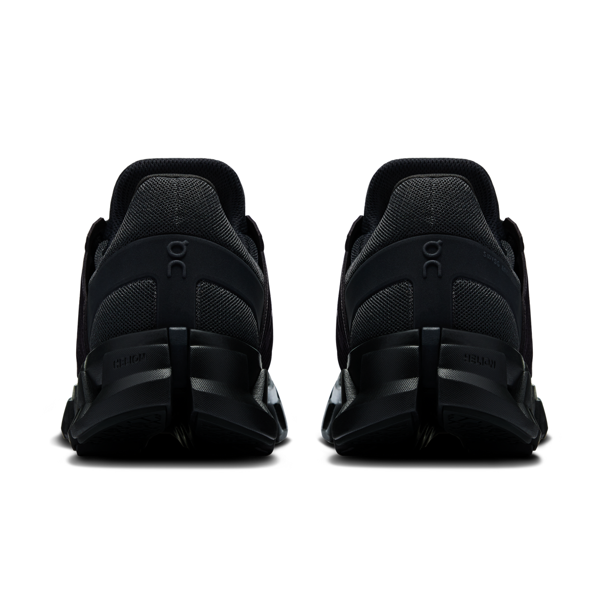 Women's black running shoes showing heel padding and rear On logo