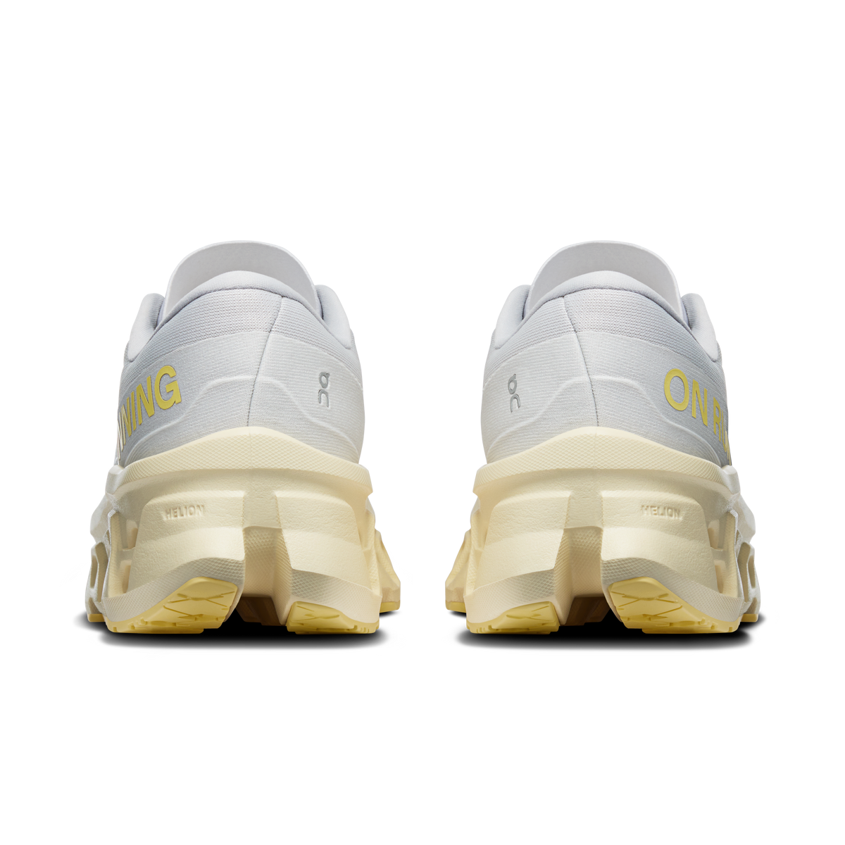 On Cloudmonster 3 heel view: light gray upper with yellow-tinted foam