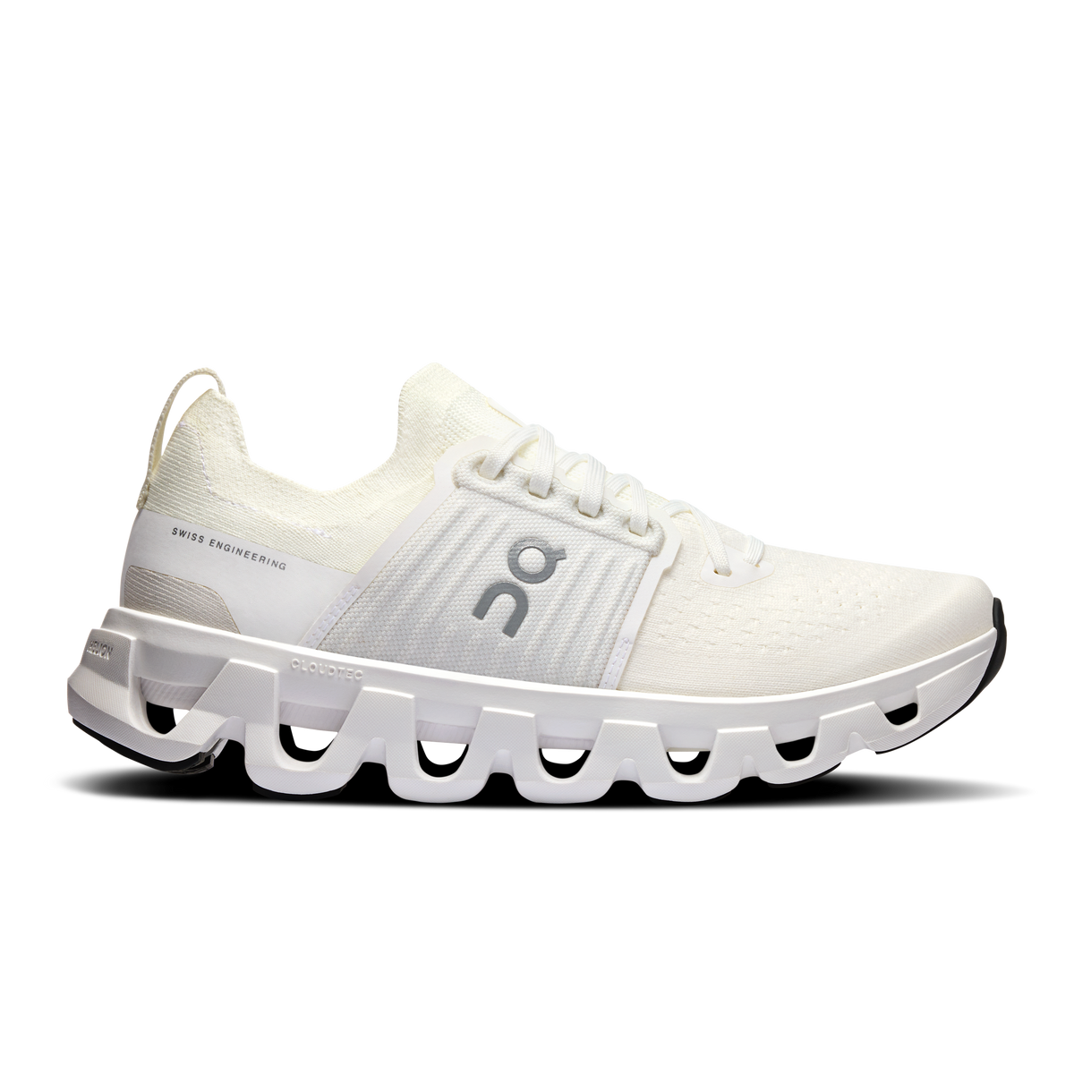 White women's running shoes with CloudTec cushioning pods and lace-up upper