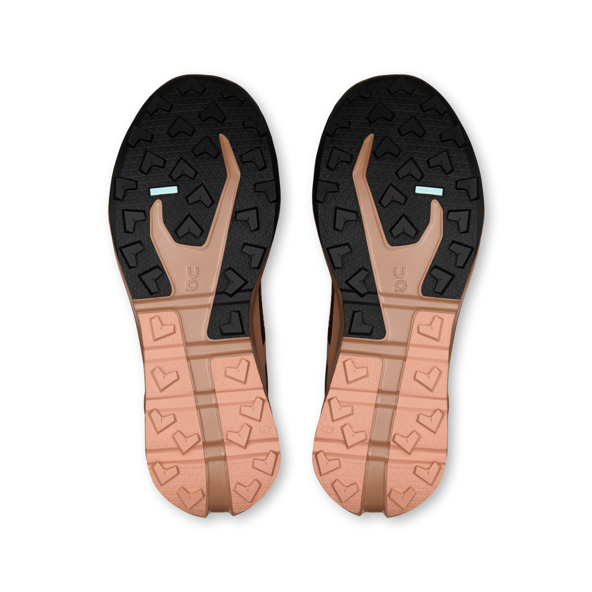 Pair of waterproof shoe outsoles with rugged tread pattern, dark and tan soles