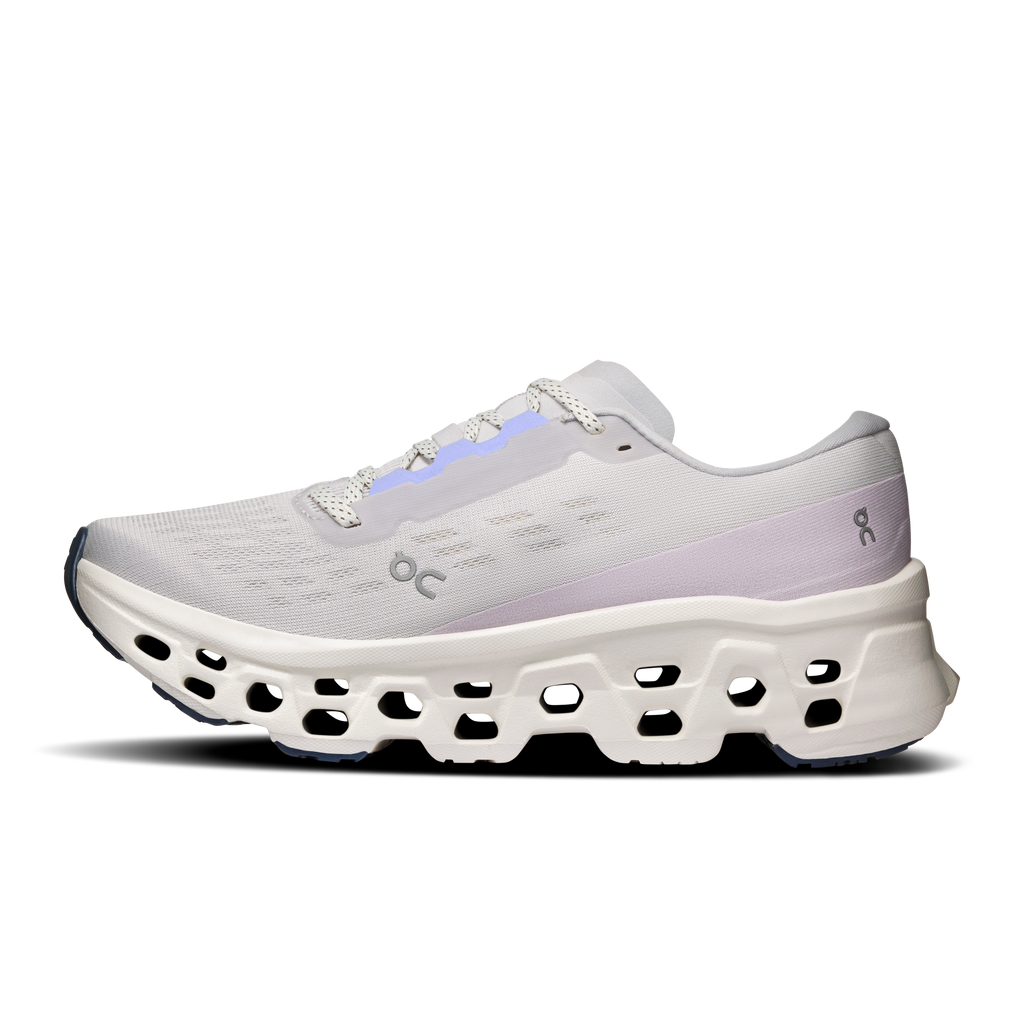 Women's wide running shoes, side view with lavender heel panel and cushioned cutout sole