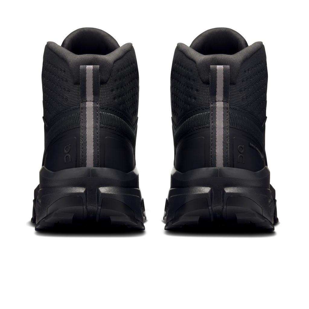 Black mid waterproof hiking shoe heels with pull tab and cushioned back collar