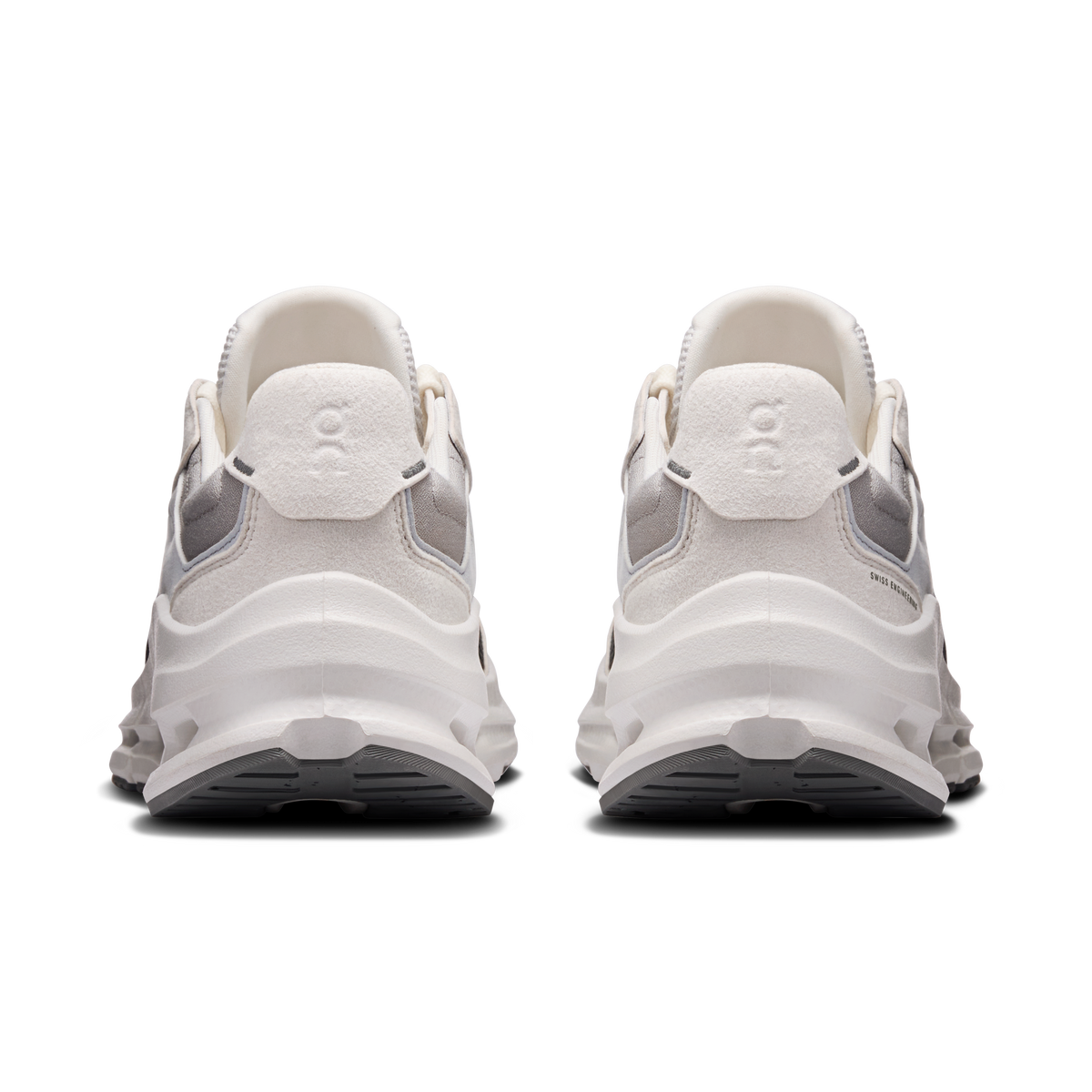 Women's running shoes heel view with padded collar, gray accents, and white midsole