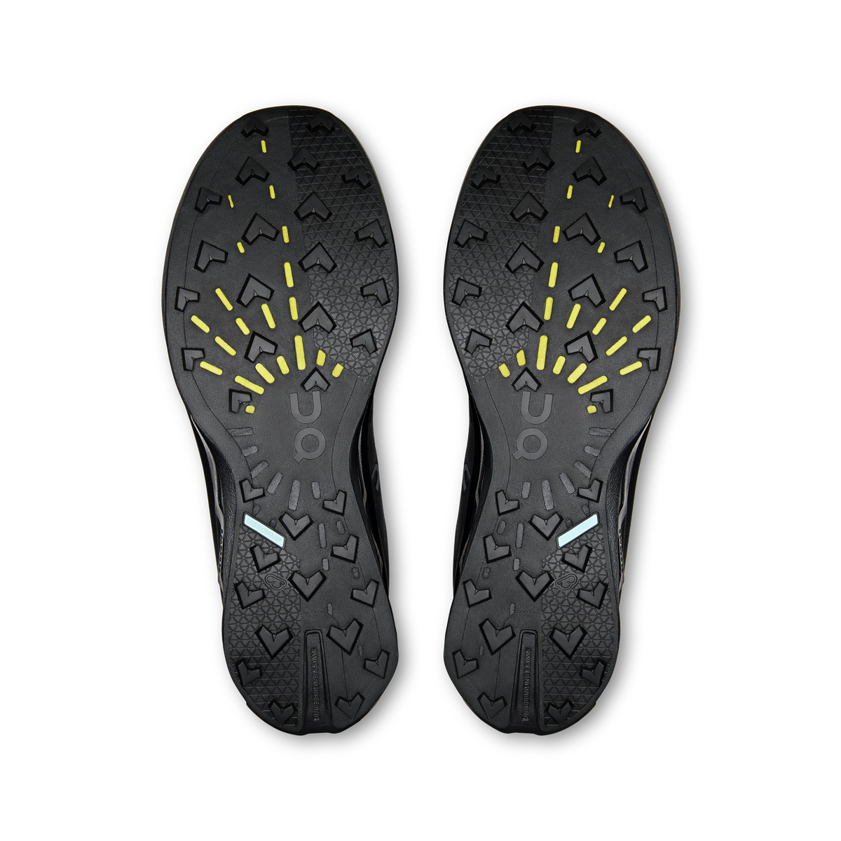 Pair of On shoe outsoles, dark tread pattern with yellow traction details