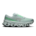Women's running shoes with light gray upper, mint green accents, and Cloud-style outsole