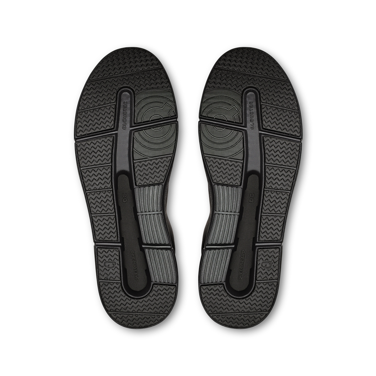 Black outsole view of low-top sneakers with textured traction pattern
