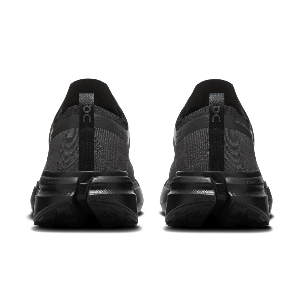 On men's black running shoes from back view with heel cushioning and laces