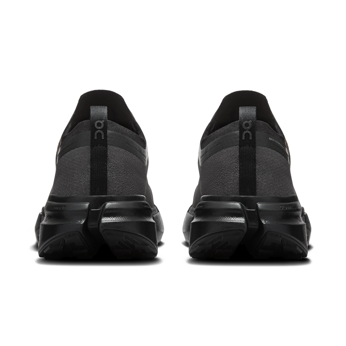 On men's black running shoes from back view with heel cushioning and laces