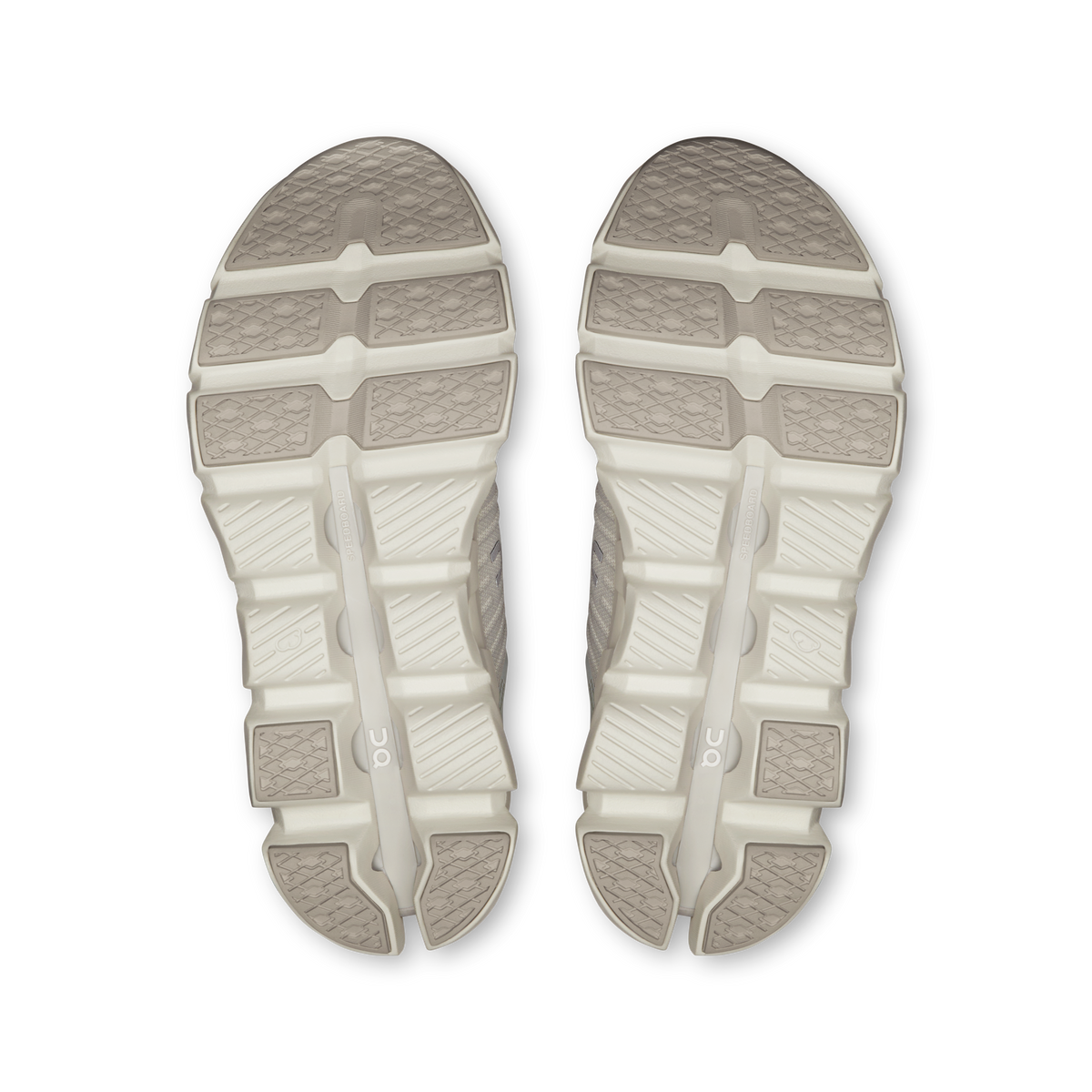 Women’s shoe outsole pair with light gray tread and white cushioning pods