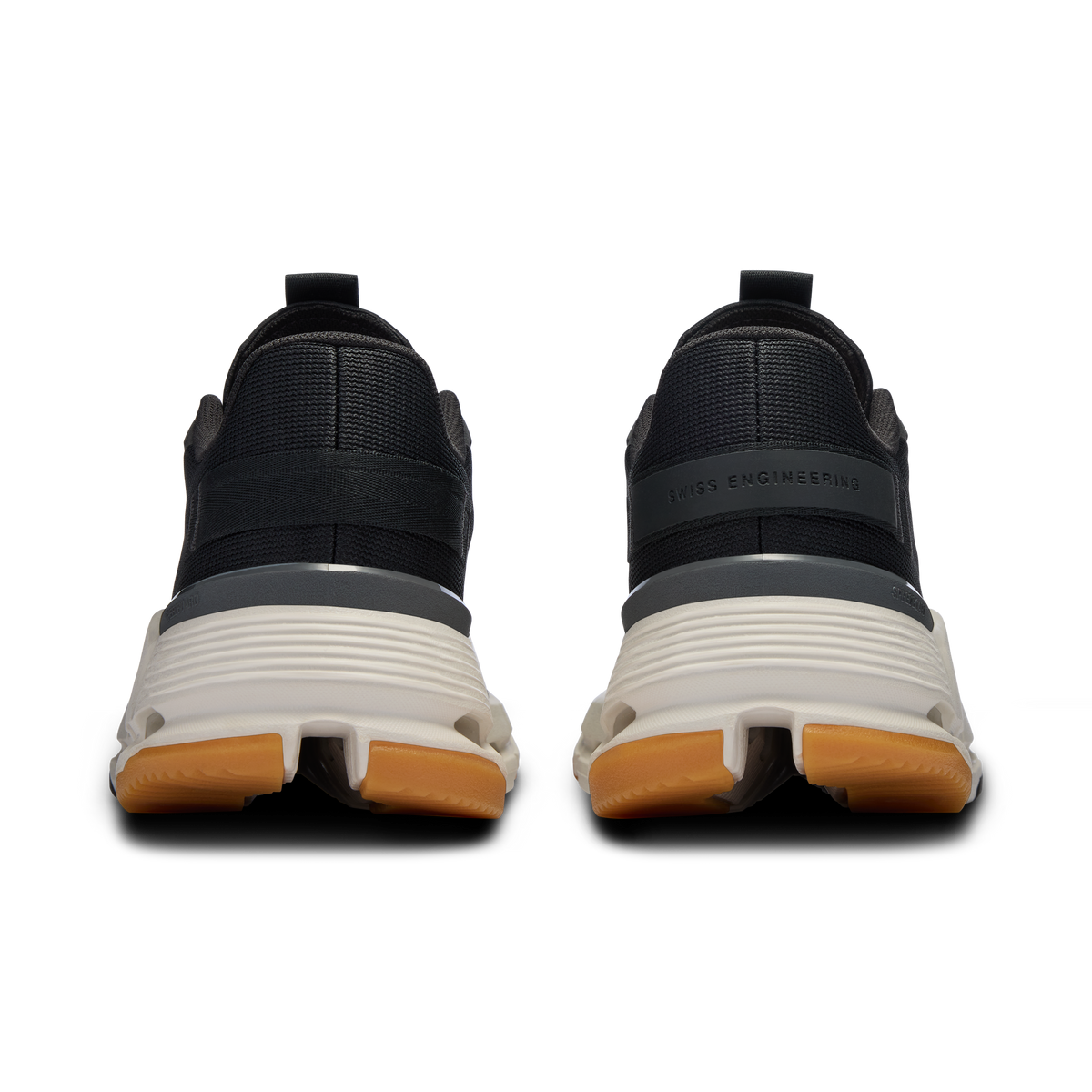 On Cloudnova women's shoes, rear view of black upper with ivory cushioned midsole