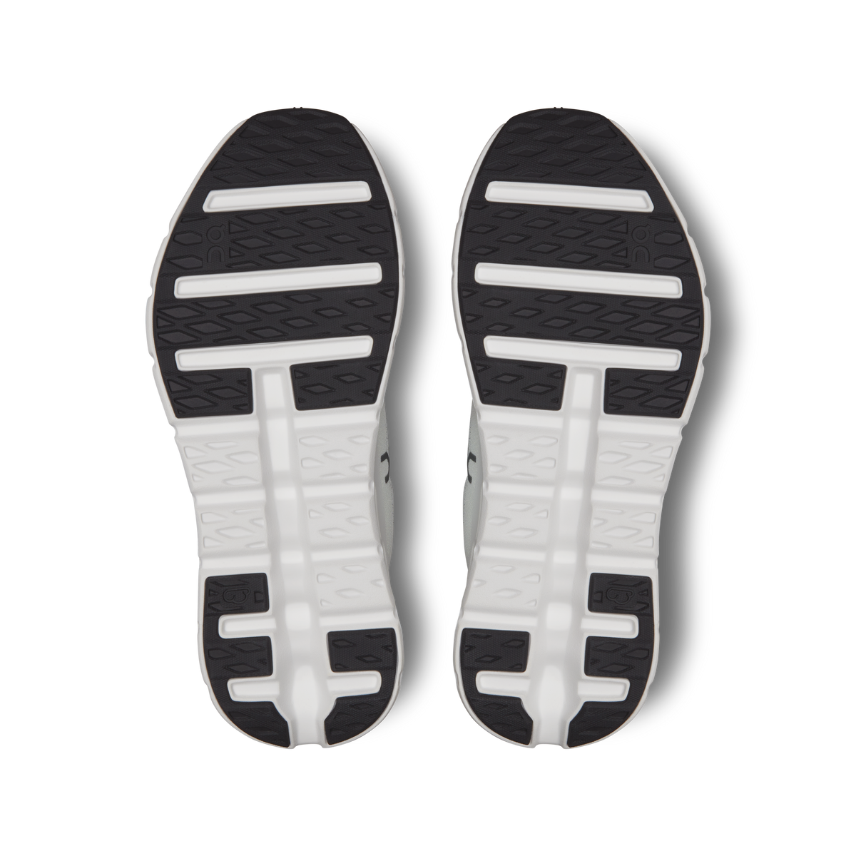 Cloudtilt shoe outsole, textured tread with black rubber sections on white base