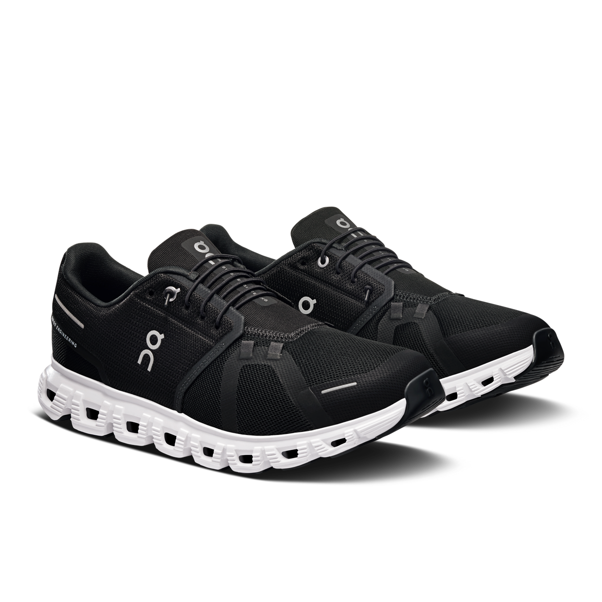 On Running Cloud 6 wide black running shoes with white cloud midsole, side view