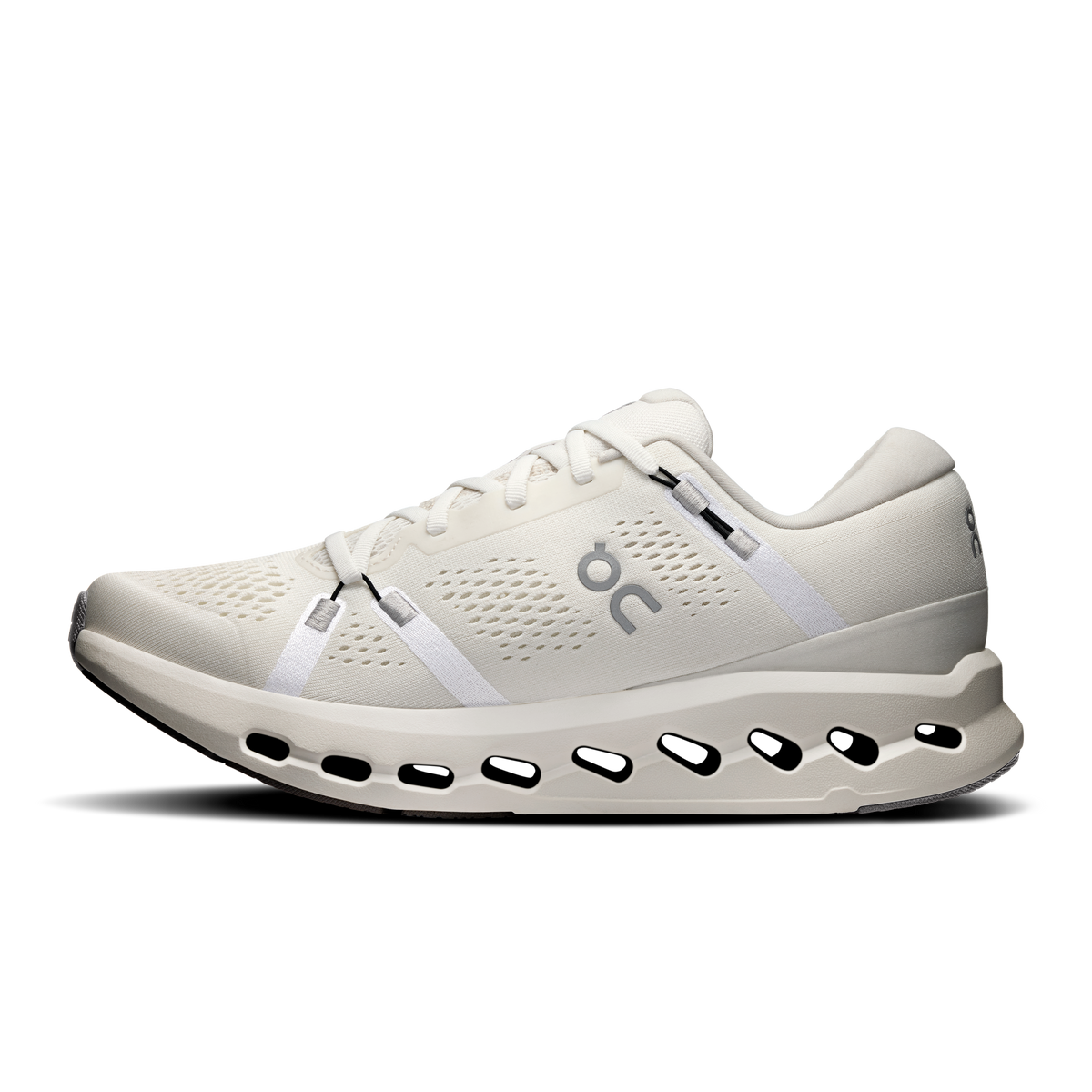Men's ivory running shoes with side stripe, lace-up closure, and cushioned sole pods