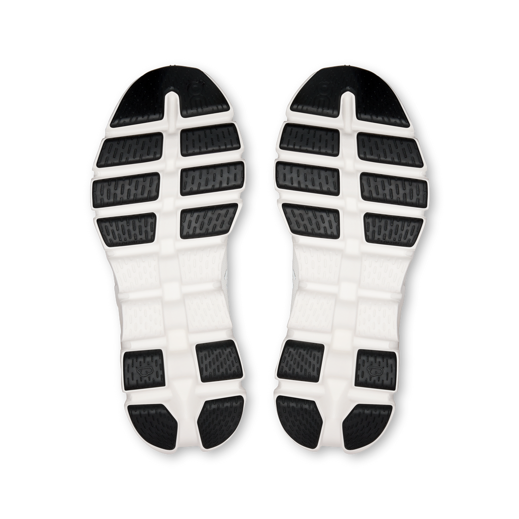 Women's shoe outsoles with white rubber tread and dark grip sections