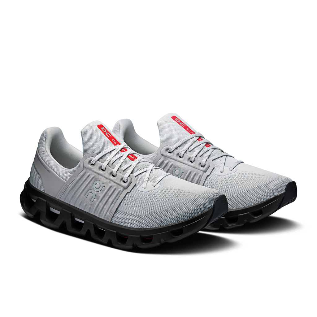 Men's running shoes, light gray upper, black sole, red heel tabs