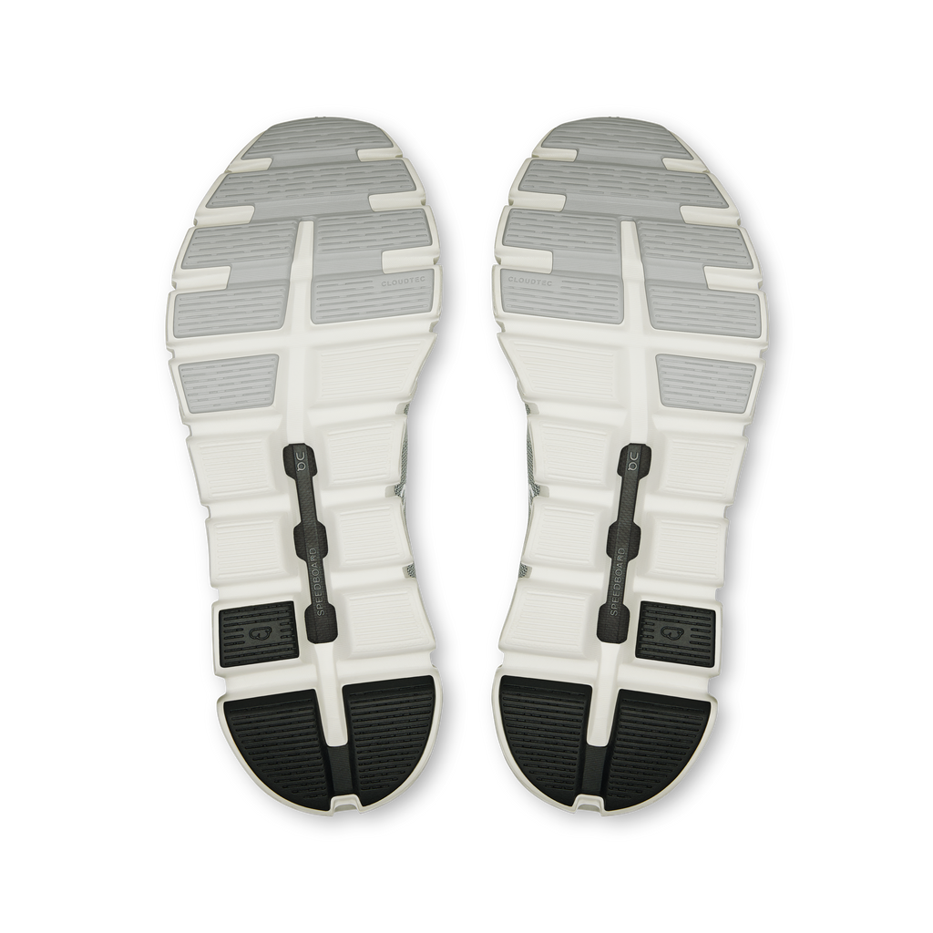Pair of shoe soles: white tread with black rubber pods and arch grooves