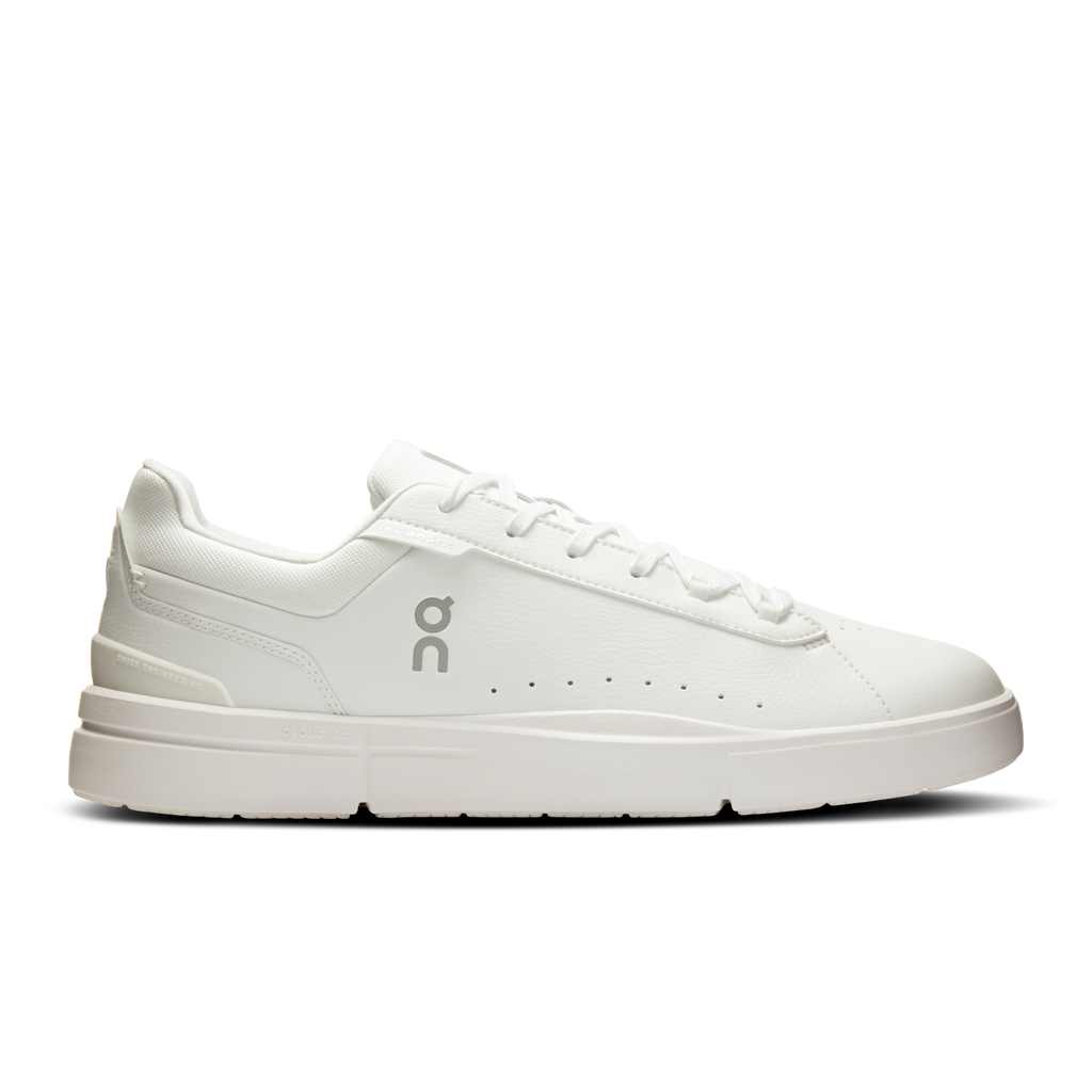On men's white lace-up sneakers with low-profile sole and cushioned midsole