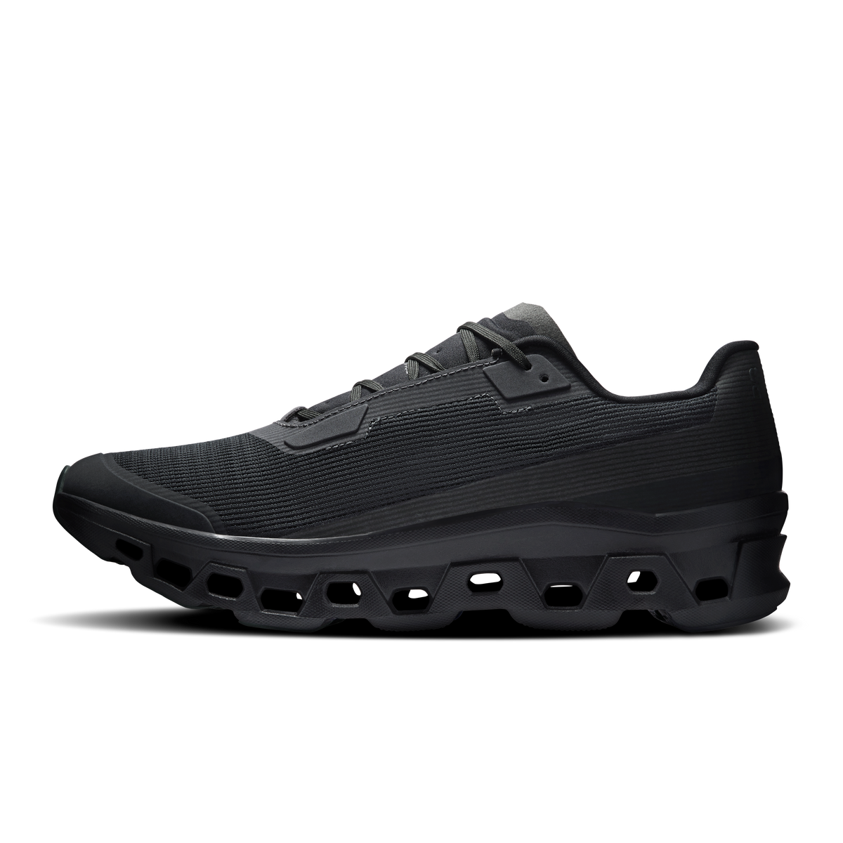 Men's black low-profile running shoes with padded tongue and CloudTec outsole