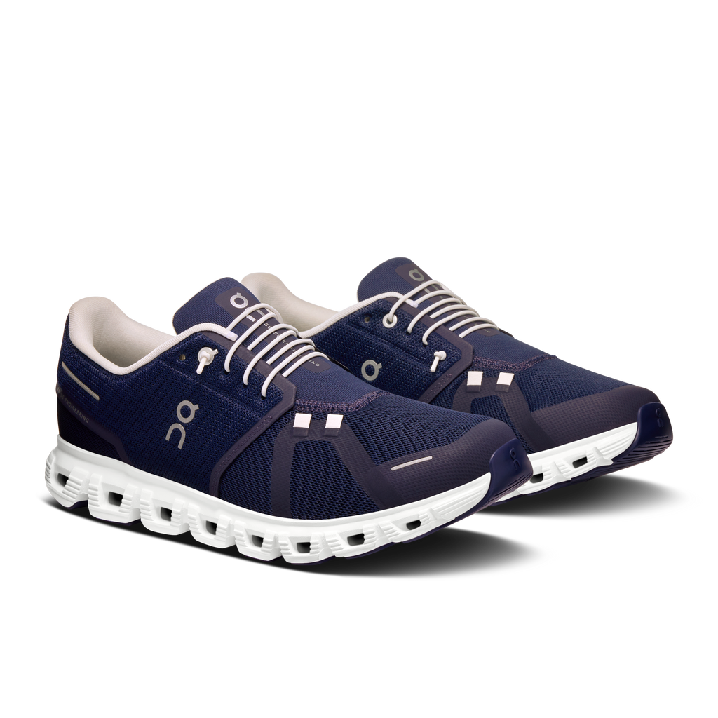 Men's navy running shoes with white laces, On logo, and chunky sole pods