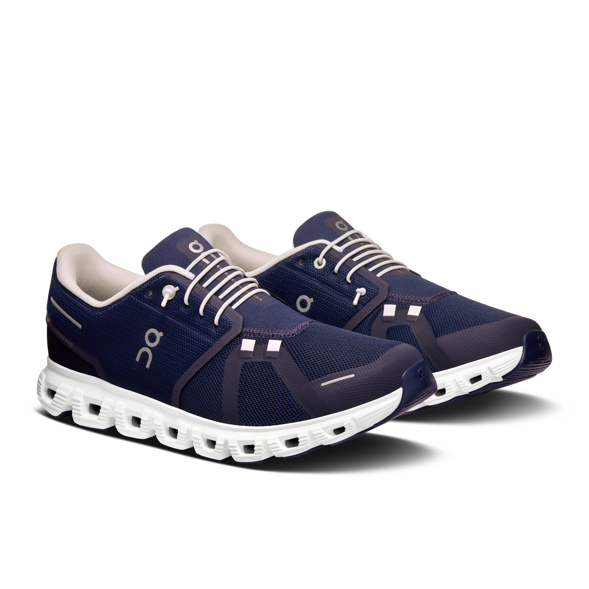 Men's navy running shoes with white laces, On logo, and chunky sole pods
