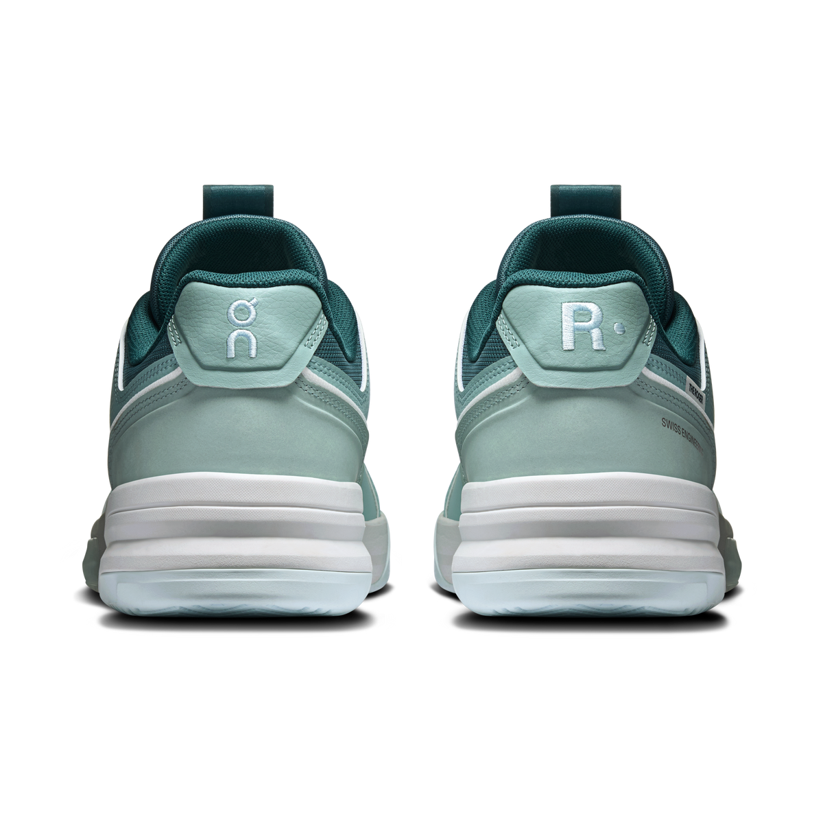 Men's heel view sneakers in light blue with teal collar and back tab