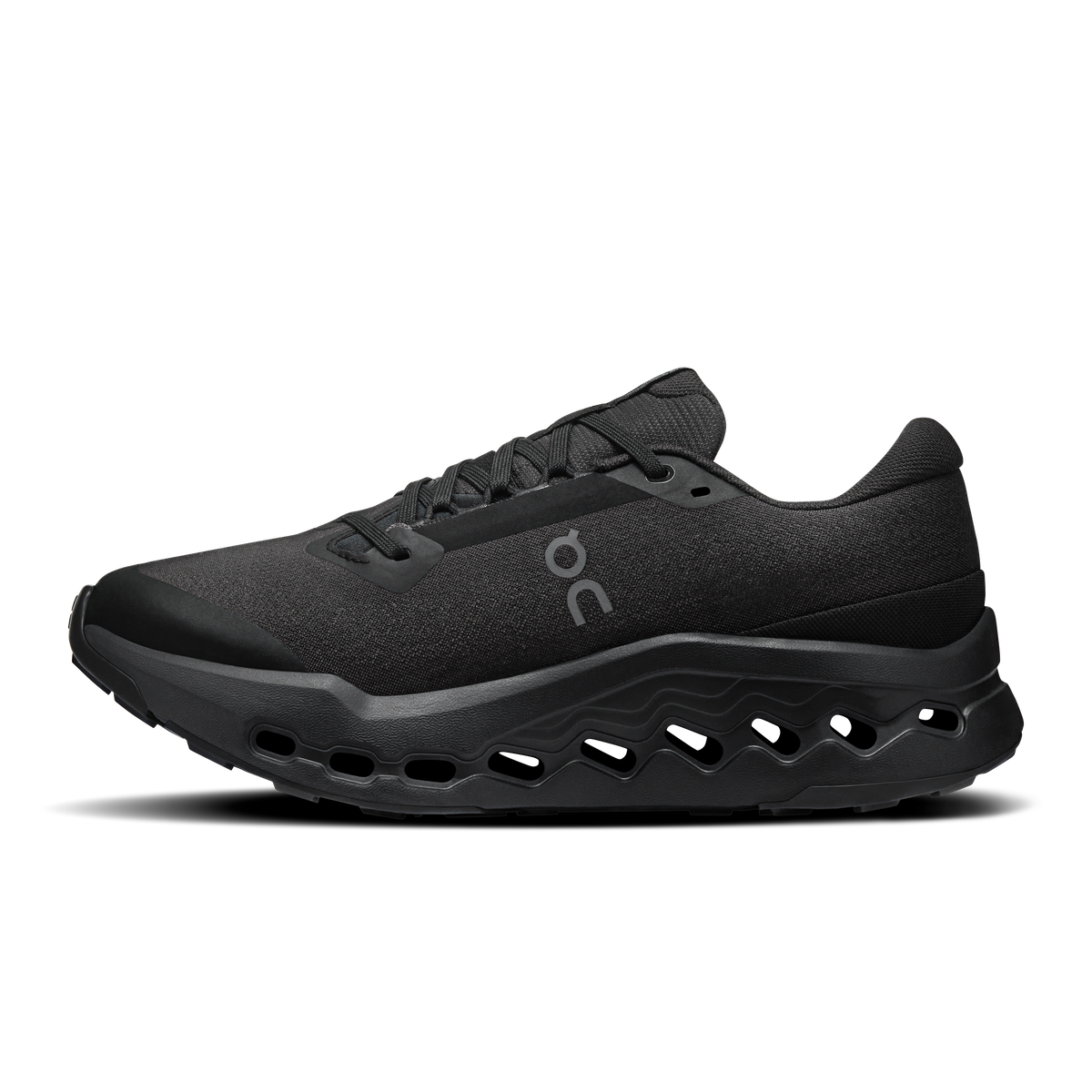 Black waterproof trail shoes with lace-up upper and grippy CloudTec midsole