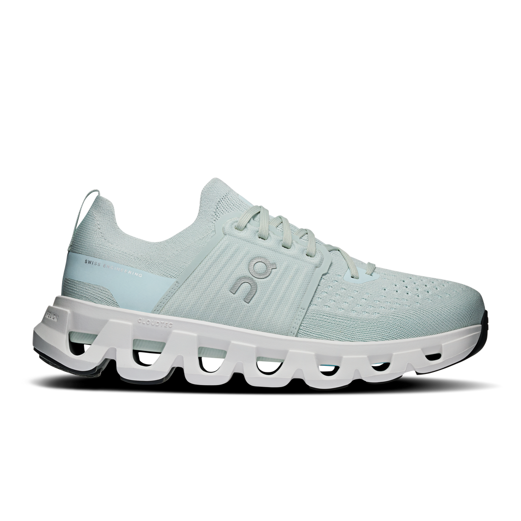 Light blue running shoes with white CloudTec sole and lace-up design